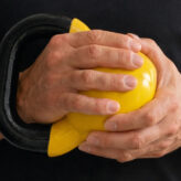 The FITforIN Grip: A Neuromechanical Framework for Hand–Implement Interaction, Force Transmission, and Motor Control in Kettlebell Training